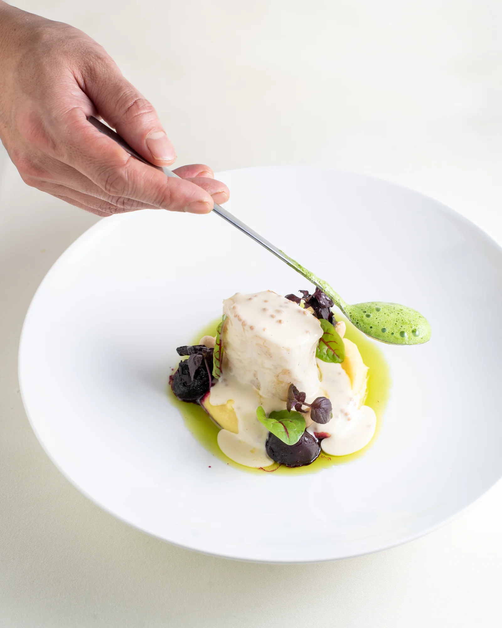 The finishing touch to a dish in the kitchen